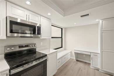 Kitchen with custom built in desk