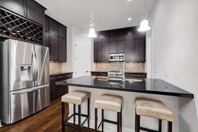 Built in wine rack about the fridge.