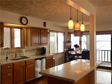 Cool lighting over breakfast bar, and note the din