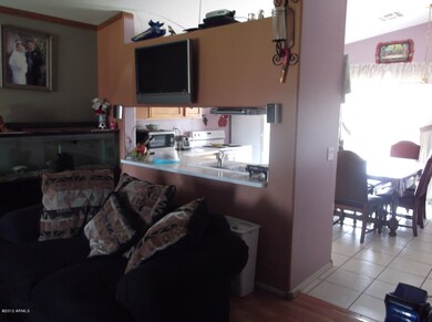 ANOTHER VIEW OF LIVING ROOM TOWARDS THE