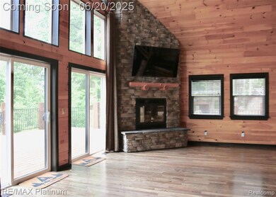 wood burning fireplace in greatroom
