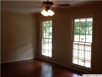 Living room with two windows to allow lots of natu