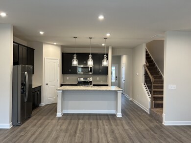 This is a photo of one of our model homes. Please know that some of the exterior and interior finishes, paint, and amenities may vary.