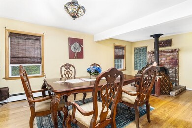 Dining room with wood burning stove. (Current owne