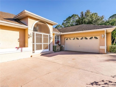 820 Robert Ave, Lehigh Acres, FL 33936 - photo 2