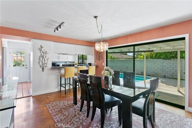 Family/dining area is the hub of this home...with space for large family meals, breakfast bar for homework or 