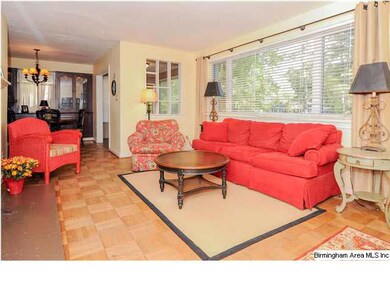 The living room opens up into the dining area.