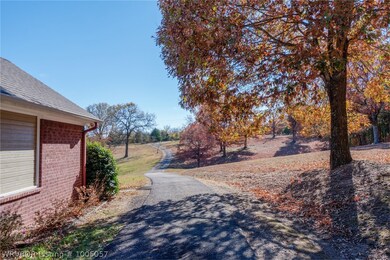Driveway to house. Rear entry garage.