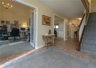 Spacious entry welcomes friends and family