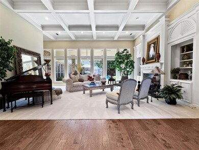 Stunning formal living room boasts 14 foot coffere