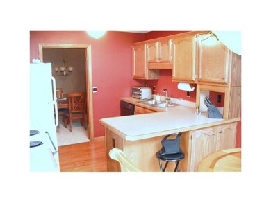 Kitchen. Convenient eat in kitchen with solid oak 