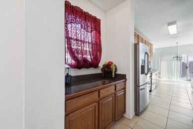Kitchen featuring pendant lighting, an inviting ch