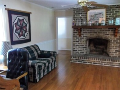 Family Room with Wood Burning Fireplace