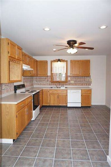 Spacious kitchen has ample room for a eat in table