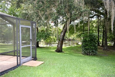 View from pool cage to lake