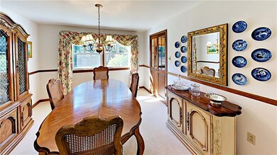 Formal dining room with chair rail.