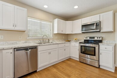 ... including this bright, white kitchen ...