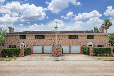 Traditional exteriors with red brick construction, window shutters and wrought iron fencing with brick pillars. Each unit has its own full sized driveway with extra parking.