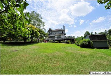 Back of house....plenty of room to play!  Such a p