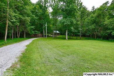 Driveway from paved, county maintained, Deertrace Parkway