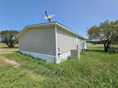back corner of home from driveway (Electric Car Ch