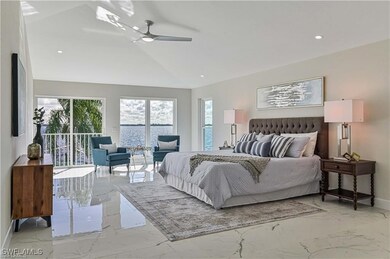 Bedroom featuring light marble finish flooring, va