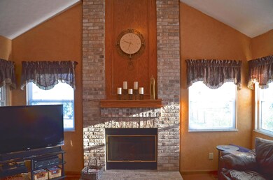 floor to ceiling stone fireplace