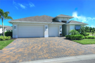 View of front of house with stucco siding, an attached garage, driveway, and roof with shingles