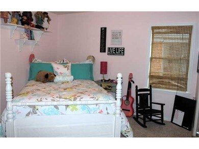 This bedroom has carpet and a great oversized clos
