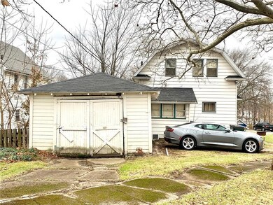 Rear of house & 1 car garage
