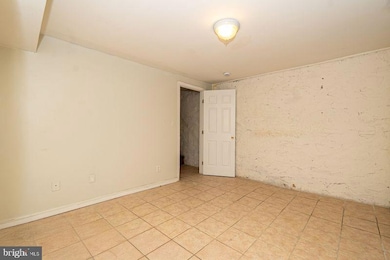 307 E 25th St unit BASEMENT APARTMENT, Baltimore, MD 21218 - photo 5