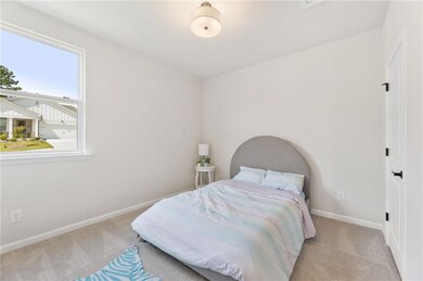 Bedroom with carpet flooring