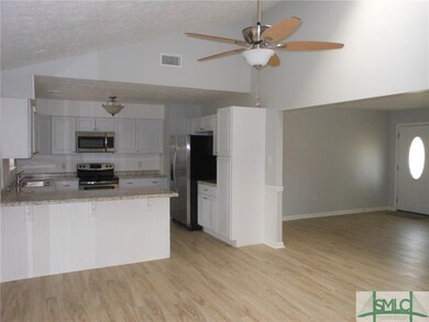 All New White Kitchen Cabinets and New Countertops