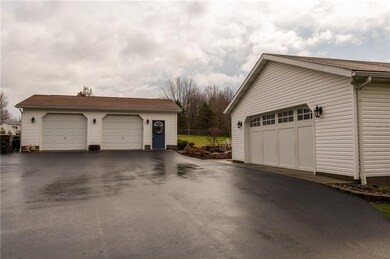 GARAGES GALORE!--2-CAR ATTACHED HEATED FARAGE GARA