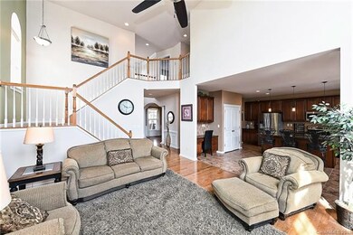 Great room is open to the kitchen providing the pe