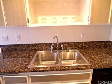New sink and faucet. Granite counters 1 yr old.