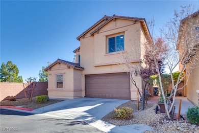 Traditional home featuring fence, concrete drivewa