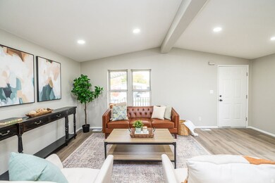 Living area with recessed lighting and wood finished floors