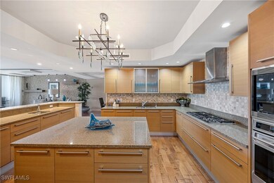 13675 Vanderbilt Dr unit 406, Naples, FL 34110 - photo 3