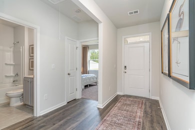Interior space featuring dark hardwood / wood-style floors