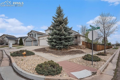 Obstructed view of property with concrete driveway and a residential view