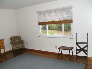 Living Room. THE LIVING ROOM BOASTS A LARGE PICTUR