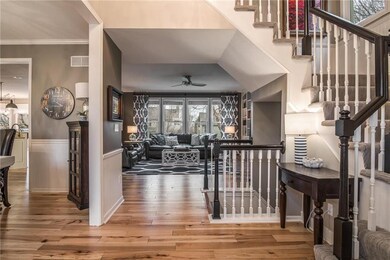 Enter through the new front door into the soaring 