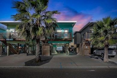 Property at dusk featuring a carport and stairway
