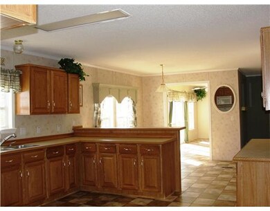 Kitchen. KITCHEN, DINING ROOM AND A VIEW OF THE SU