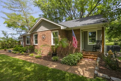 Experience true southern hospitality on the side rocking chair porch, perfect for enjoying the gentle breeze and embracing the serene surroundings.