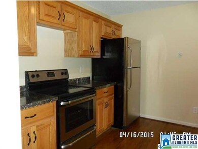 Black and stainless appliances are complemented by