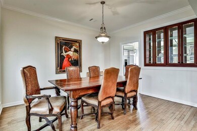 Formal Dining with see thru hutch to kitchen