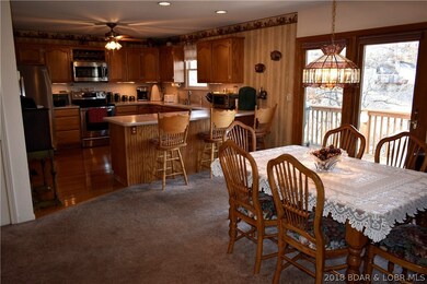 Looking into kitchen & dining from living area; re