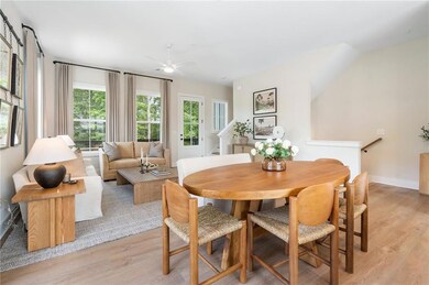 Dining room featuring light wood-style floors and a ceiling fan